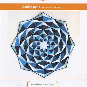 May include: A geometric quilt titled "Arabesque" by Orange Dot Quilts, featuring a starburst design in shades of blue and white. The finished quilt size is 52" x 52". The pattern uses foundation paper piecing and is rated advanced.