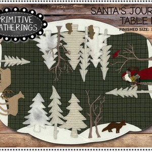 May include: A white table mat with a green plaid background and a winter scene featuring a red cardinal, a fox, deer, and trees. The text "SANTA'S JOURNEY TABLE MAT" and "FINISHED SIZE: 18 1/2" x 28" is printed on the mat.