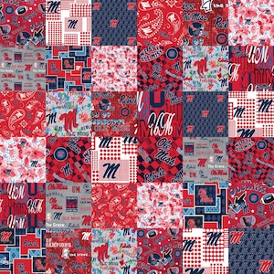 May include: A red, white, and blue patchwork fabric featuring the Ole Miss Rebels logo, the words "Ole Miss", and the phrase "We Are Ole Miss".