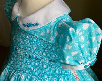 Girls dress, turquoise floral, hand smocked and embroidered, age 18 months, this is the only one available in this fabric.