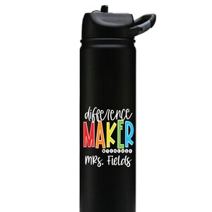 May include: Black stainless steel water bottle with a black lid and a carrying handle. The bottle has a rainbow colored graphic that says "difference maker teacher mrs. Fields".