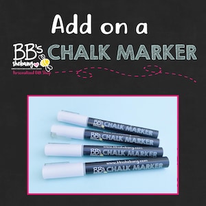 May include: Four black chalk markers with white caps and white text that reads BB's CHALK MARKER. The markers are arranged horizontally in a stack. The top of the image features the text Add on a BB's CHALK MARKER Personalized Gift Shop.