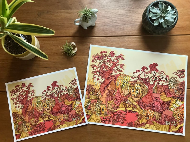 8x10 and 11x14 psychedelic art print featuring a surreal urban cityscape with melting buildings, swirly sidewalks, and whimsical trees in orange and yellow tones.