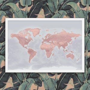 May include: A framed world map with a rose gold foil finish. The map is printed on a light gray background.