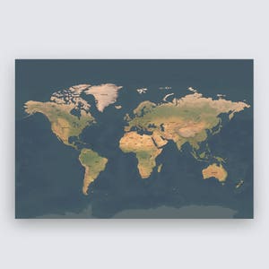 May include: A detailed world map with a vintage aesthetic. The landmasses are rendered in shades of tan and green, contrasting with the deep blue ocean. Country names are labeled in a small, readable font. The map is rectangular and appears to be printed on a matte surface.