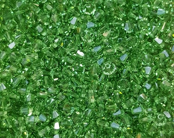 4 mm Swarovski Bicone gefacetteerde kristalkralen, Peridot - Selecteer 20 of 50 kralen