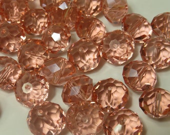 Cuentas Rondelle de cristal facetado rosa de 14x10 mm - 10 piezas