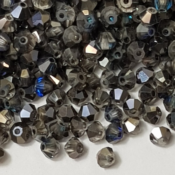 Perles toupies en cristal Swarovski à facettes bleu Bermudes 3 mm - 100 pièces