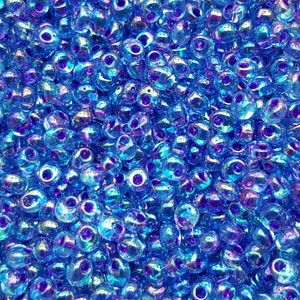 Magatama 4mm Japanese Seed Beads - Fuchsia Lined Blue MA4-2169 - 20 grams