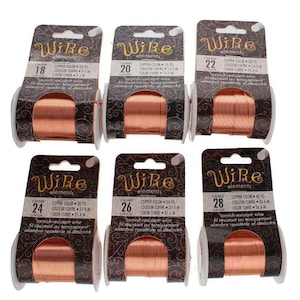 May include: Six spools of copper-coloured wire, labelled with gauges 18, 20, 22, 24, 26, and 28. Each spool has a brown and gold label with the "Wire elements" logo and text in English, French, and Spanish.