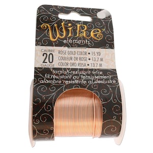 May include: A spool of 20 gauge rose gold coloured wire, tarnish-resistant, 13.7 metres long. Wire elements.