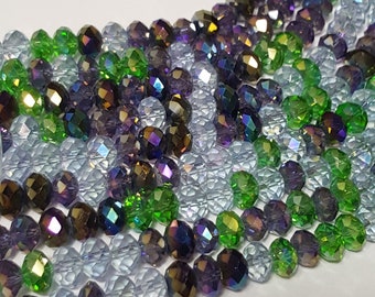 8 x 6 mm fasetterade tjeckiska eldpolerade rondeller/munkar i glas, kristallviolett grön magi - Välj 7,5" sträng (36 st) eller 12 st
