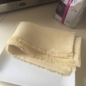 Yellow linen fringed edges dinner napkins