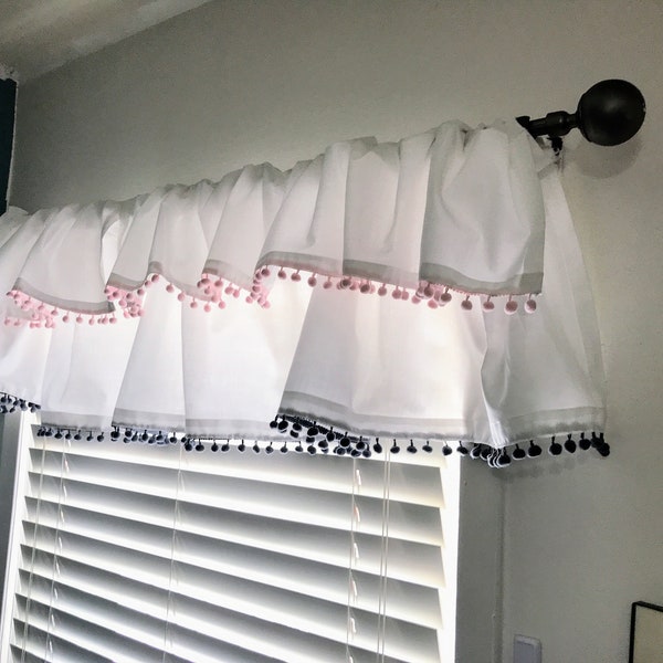 Two tier window toppers with Pom Pom trimmings./ White toppers with pink and gray Pom Poms.