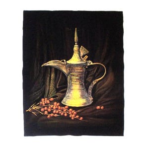 May include: A metallic silver-toned dallah coffee pot with intricate engraved patterns, a long curved spout, and a pointed lid, accompanied by a small cluster of orange berries on thin stems, all set against a dark, draped fabric background.