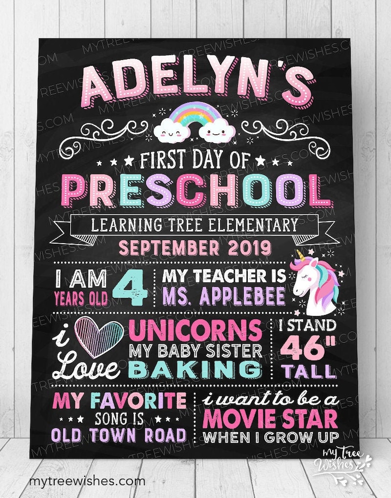 May include: A black chalkboard with a pink, purple, and blue unicorn illustration. The text reads 'Adelyn's First Day of Preschool Learning Tree Elementary September 2019 I am 4 years old My teacher is Ms. Applebee I love unicorns I stand 46' My baby sister baking tall My favorite song is Old Town Road I want to be a movie star when I grow up mytreewishes.com'
