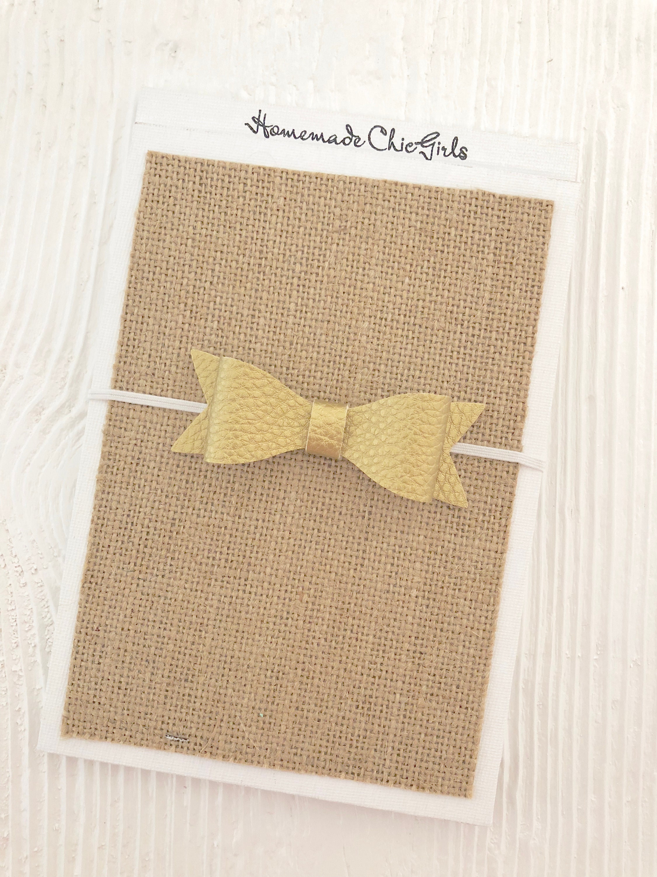 gold bow for baby