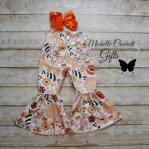Girls Halloween ghost candy print bell bottom, Girls Halloween Pants, Truffles, 12M, 18M, 2T, 3T, 4T, 5/6, 6/7, 7/8, 8/9, 10, 12, 14, RTS,