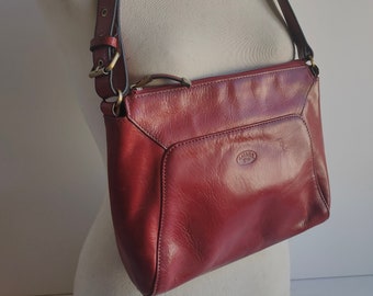French vintage red wine coloured leather shoulder bag, Katana Paris, circa 1990s.