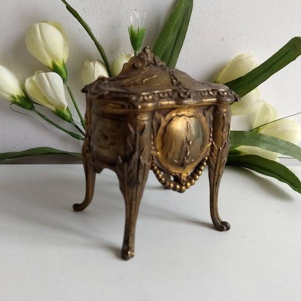 French antique bronze jewellery box, footed with red felt like interior and hinged lid, circa 1900.