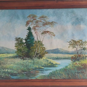 French vintage oil on canvas painting of country landscape with trees and river, signed and framed.