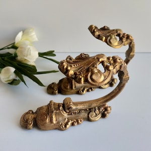 Antique French, Louis XV pair of heavy,  bronze curtain tie / hold backs, circa 1900.