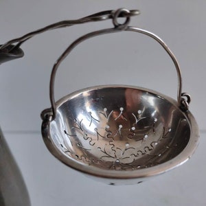 Christofle Paris, antique French tea strainer, silver plated and stamped, circa 1900.