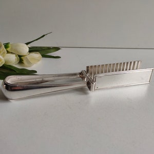 Antique French, Christofle silver plated asparagus serving tongs with maker marks, circa early 1900s.