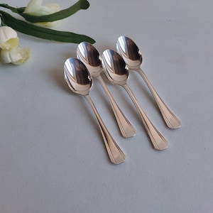 Christofle Boreal, set of 4 silver plated Art Deco, tea spoons, Luc Lanel circa 1930s.