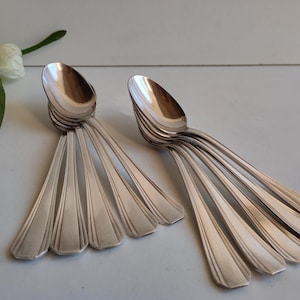 Christofle Boreal set of 5 large / table spoons, Luc Lanel, Art Deco silver plated,  circa 1930s.
