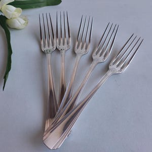 Christofle Paris, Boreal, Luc Lanel French vintage set of 5 dinner / large forks, circa 1930s.