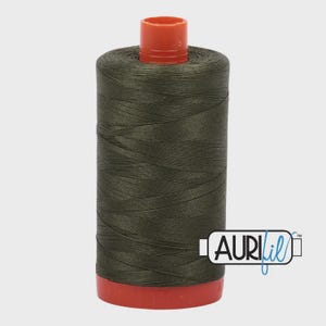 May include: A spool of dark olive green thread with a red base and top. The thread is tightly wound, and the spool has the Aurifil logo on the side. Ideal for sewing and quilting projects.