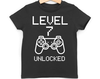 Level 7 Unlocked Kids T-Shirt, Age Seven Third Birthday Number Tee, Video Gamer Gift