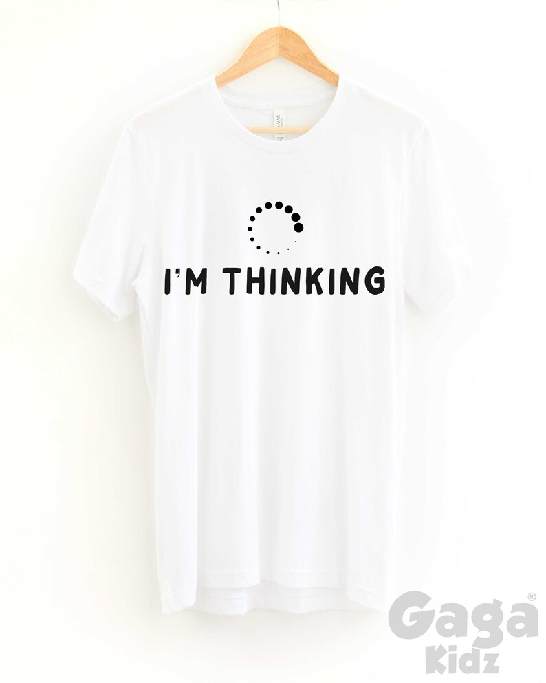 May include: White t-shirt with a black loading icon and the text "I'M THINKING" printed on the front.