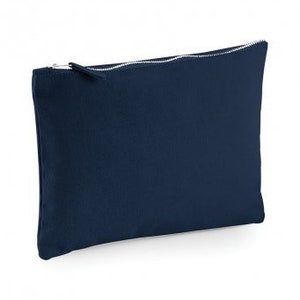 May include: A dark blue zippered pouch made of canvas.