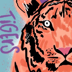 May include: A close-up of a tiger's face with a purple crown above it. The tiger has orange fur with black stripes and a white nose. The background is a light blue with white speckles. The word "Tigers" is written in purple on the left side of the image.