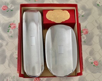 Linek chrome hairbrush and clothes brush, unused and boxed vintage travel set