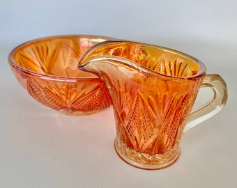 Carnival glass milk jug and sugar bowl, vintage collectible orange pressed glass dish