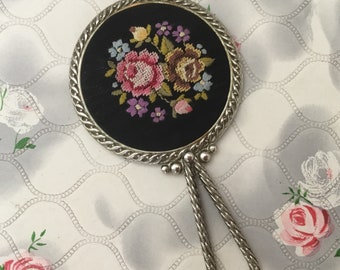 Mini silver and black vintage hand mirror, with pink floral embroidery, c 1950s
