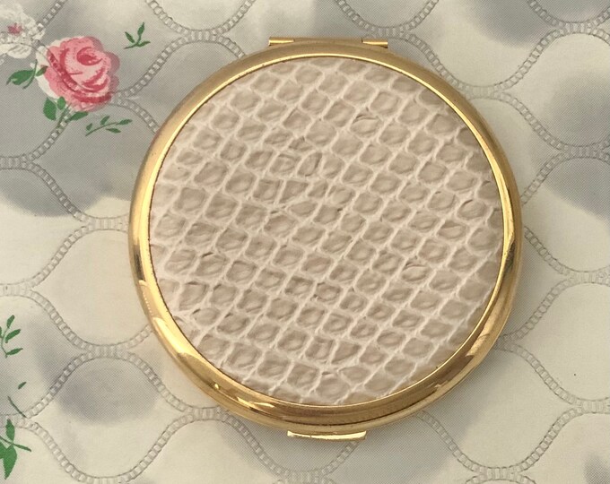 Stratton combination powder compact with faux white reptile leather, c 2000s round gold tone makeup mirror,