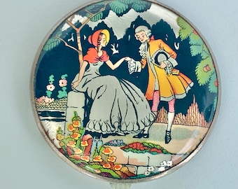 Gwenda  tap flap loose powder compact with crinoline lady, vintage foil makeup mirror with Regency couple