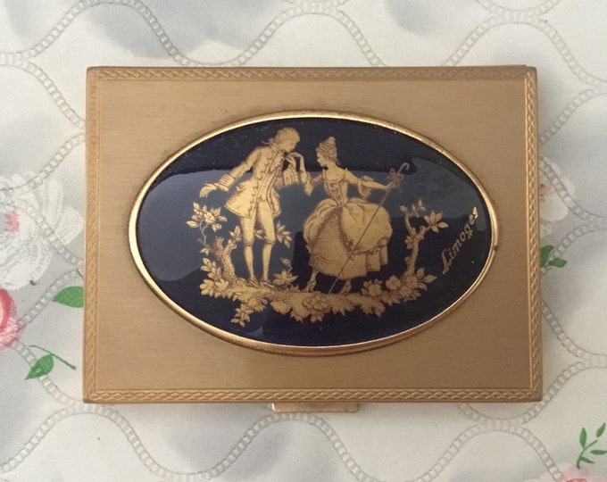 Limoges loose powder compact with ceramic tile, vintage black and gold makeup mirror with 18th century romantic couple on a porcelain plaque