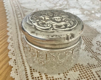 Silver hallmarked 1903 glass trinket pot, antique Edwardian cut glass jar with cherubs