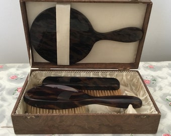 Vintage brown plastic brush with hairbrush, clothes brush and hand mirror, c1940s dresser set with round mirror