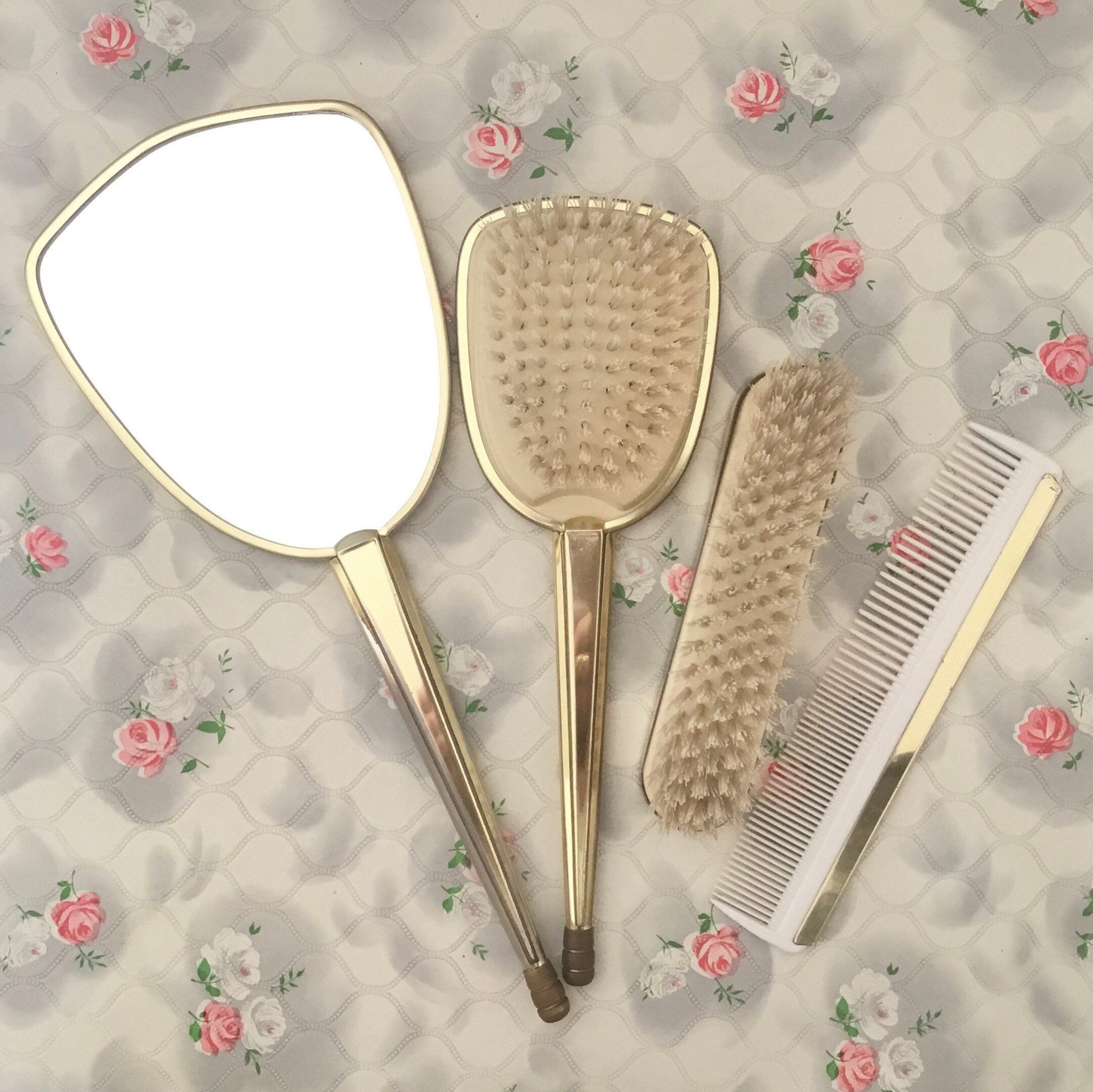 Brush set with hand mirror, hairbrush, clothes brush and comb, mid