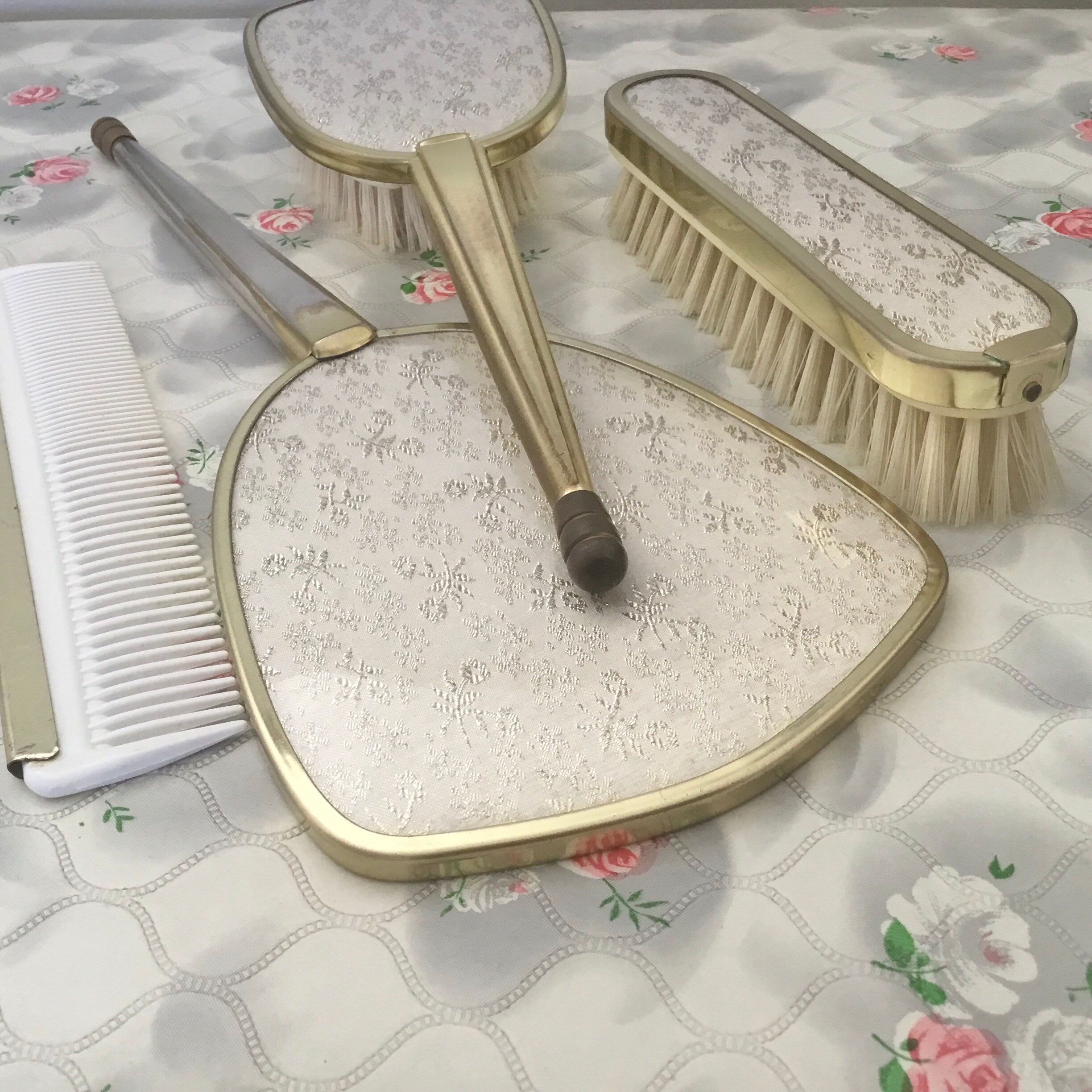 Brush set with hand mirror, hairbrush, clothes brush and comb, mid