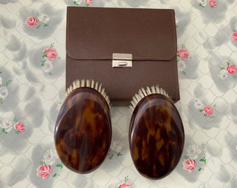 Halex plastic gentlemen’s hairbrushes with brown pouch, mid-century vintage grooming brushes
