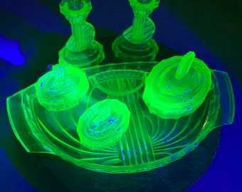 Uranium vaseline glass candlesticks, tray and powder bowls, green Art Deco dressing table set
