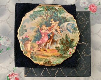 Stratton Queen convertible powder compact, Regency kissing couple with waterfall and cherubs, c1960s to 1970s makeup mirror