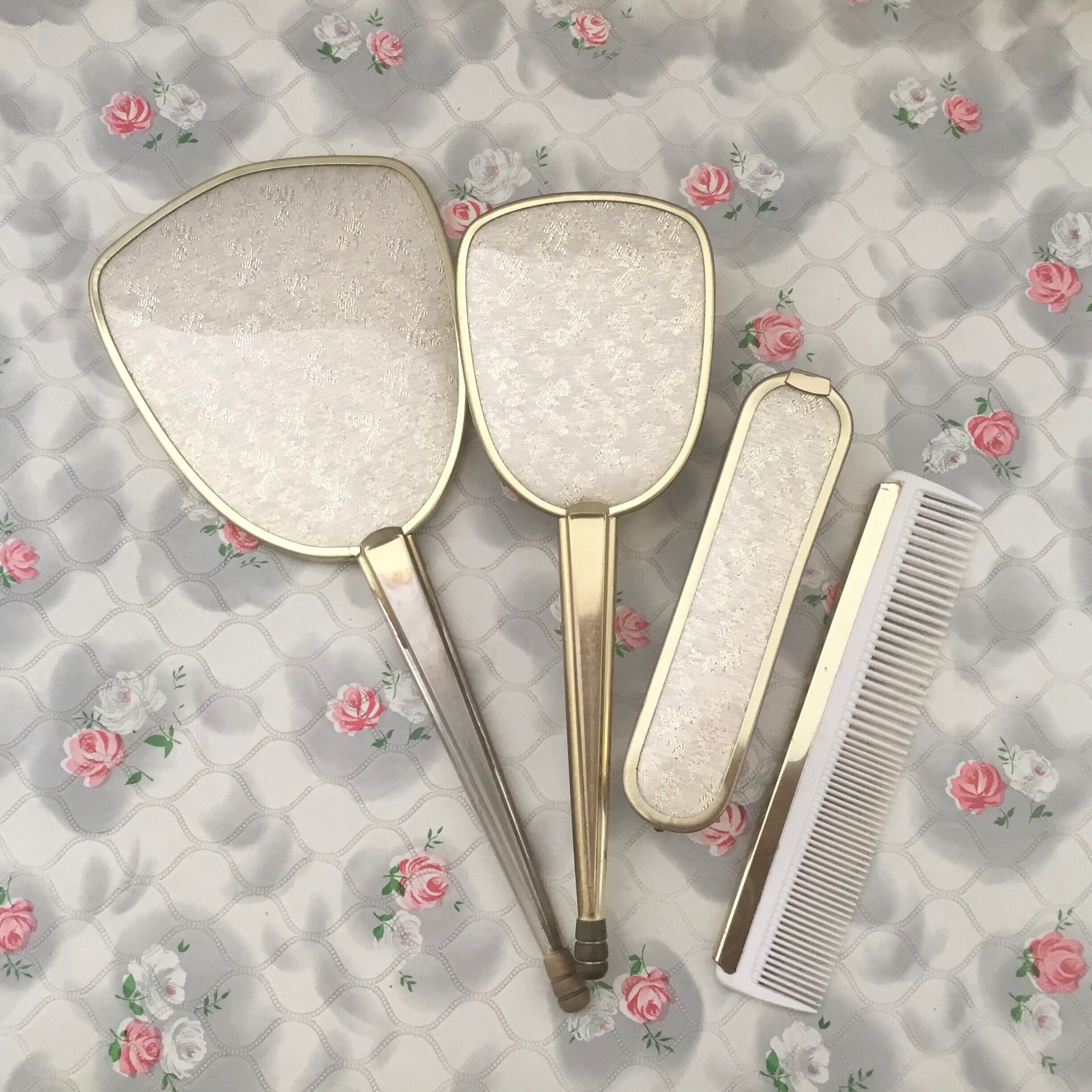 Brush set with hand mirror, hairbrush, clothes brush and comb, mid